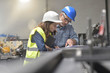 © goodluz - Metal industry manager and engineer meeting in factory