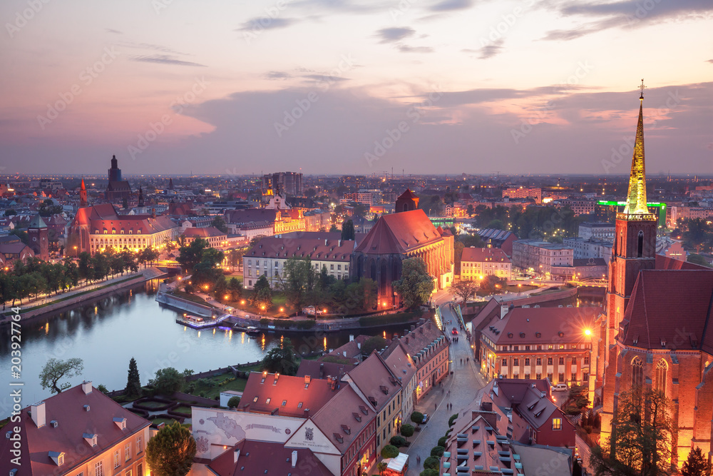 Obraz na płótnie Panorama Wrocławia o zmierzchu w salonie