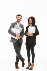 Wall Mural - Full length portrait of a business couple holding folders