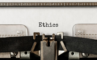 Poster - text ethics typed on retro typewriter