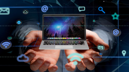 Poster - Businessman holding a Computer surrounding by app and social icon - 3d render
