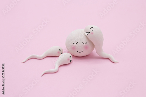 Fotografie, Obraz Handmade Polymer Clay Figure of Human Sperm Impregnate a Fertile Human Egg