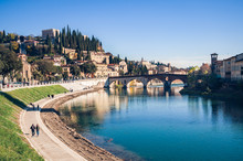 Bend Of The Adige River That Crosses Verona (Italy) And View Of The Stone Bridge And San Pietro Castle.