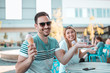 © Nebojsa - Happy couple enjoying sunny weather while they eating ice cream in cone