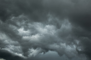 Wall Mural - dark clouds and thunderstorm with rainy, dramatic black clouds in summer