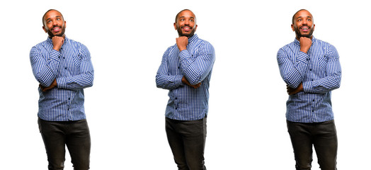 Poster - African american man with beard thinking and looking up expressing doubt and wonder