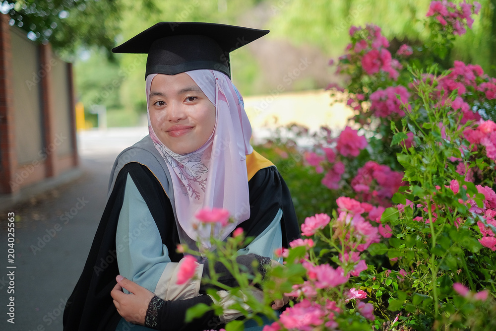 Convocation Muslim Robe Beautiful female Muslim wearing a convocation robe and posed in ...