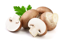 Royal Brown Champignon With Half And Parsley Leaf Isolated On White Background