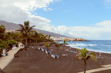 Playa Jardin  Puerto De La Cruz, In The North Of Tenerife, Canary Islands, Spain.  Jardin Beach With Black Sands Is One Of The Most Famous Beaches In Tenerife Island.