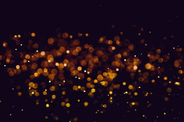 Wall Mural - Christmas blur bokeh background texture abstract light glittering stars on bokeh. glitter vintage lights background