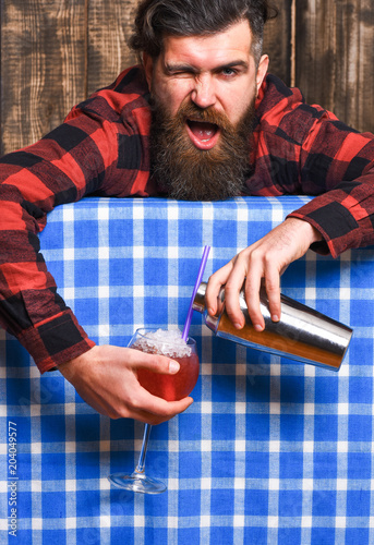 Fotografie, Obraz Barman or hipster pouring glass, makes fresh drink