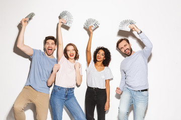 group of happy multiracial people holding money banknotes