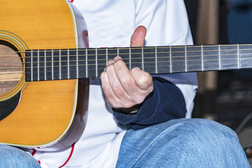 Fingers On Guitar Fretboard