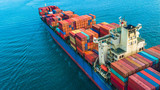 Aerial view container cargo ship carrier, Business logistic and transportation of International by container cargo freight ship boat in the open sea.