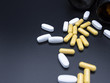 Medication pills isolated on a black background