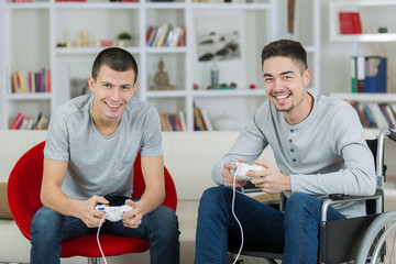 two young men playing video game