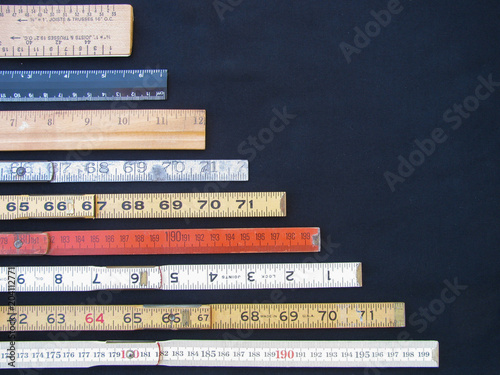 Fotografía Rulers and scales in metric and inches represent measurement, accuracy and results with copy space