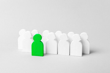 Wall Mural - Person stands out from the crowd. Leader in the business team. Concept