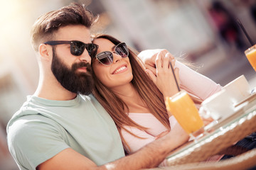 Wall Mural - Man and woman dating in cafe