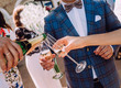 © yuriy - waiter pours champagne glasses couple love party