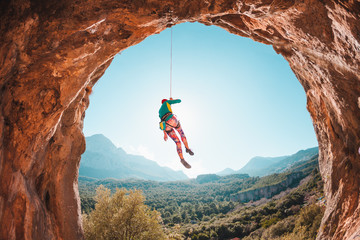 Sticker - The climber is hanging on a rope.