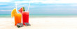 Colorful refreshing cold tropical fruit juice drinks in summer beach banner background