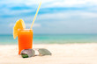 Refreshing tropical fruit juice drink at summer beach