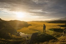 Man Looks Into Wide River Valley, Evening Mood, West Greenland, Greenland, North America
