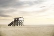 © imageBROKER - Pile dwelling on the beach of Sankt Peter-Ording, Bohler Strand, Sankt Peter-Ording, North Frisia, Schleswig-Holstein, Germany, Europe