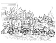 Bicycles On Bridge Over The Canals Of Amsterdam, Netherlands