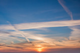 Fototapeta Na ścianę - Orange clouds on the sky at the sunset moment