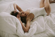 © BGStock72 - Woman in white bed