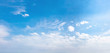 Panorama of the blue sky with white clouds