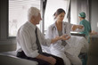 © Erickson Stock - View of a doctor getting himself examined.