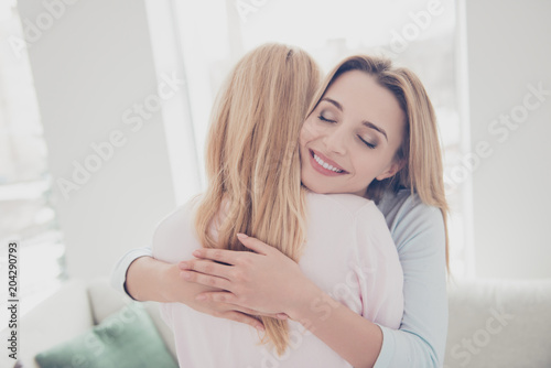Portrait of cute charming lovely beloved sweet girl enjoying warm hugs with her Tableau sur Toile