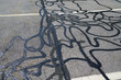 close up on asphalt road surface with crack repaired