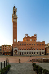 Wall Mural - Central square of Siena - Piazza del Campo and the palace Palazzo Pubblico with tower Torre del Mangia in Siena, Tuscany, Italy.