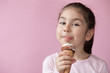 © kaganskaya115 - happy little girl with ice cream on a pastel background