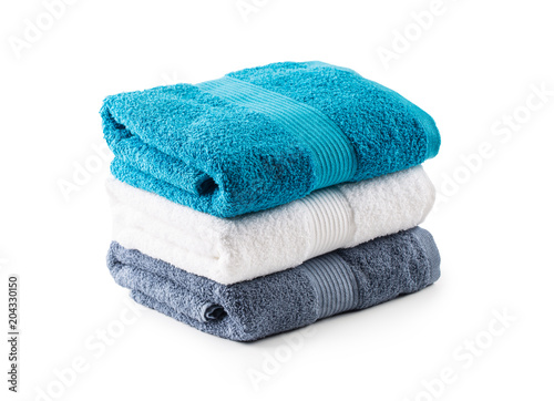 Cuadros en Lienzo Stacked blue white and gray towels isolated on white