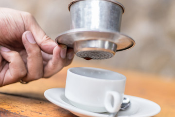 Close up of Coffee dripping in vietnamese style