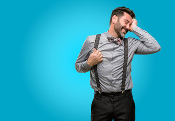 Canvas Print - Middle age man, with beard and bow tie confident and happy with a big natural smile laughing