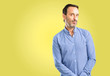 © Krakenimages.com - Handsome middle age man expressing love, blows kiss at camera, flirting