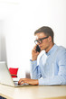 © Wisiel - Office man talking by phone