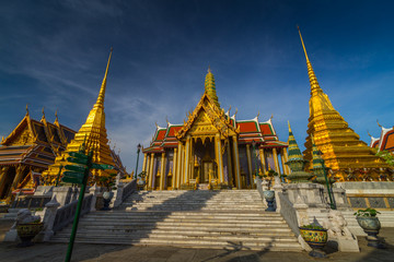 Wall Mural - Wat Phra Kaew, Temple of the Emerald Buddha with blue sky Bangkok, Asia Thailand