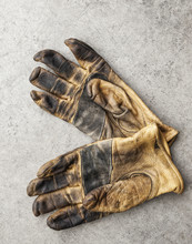 Close-up Of A Pair Of Used Work Gloves In A Shop