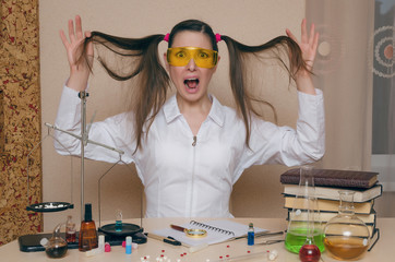 Emotional student girl on chemistry lesson. Pharmacist or apothecary woman. Scientific experiment background. Funny intern in chemical laboratory concept.