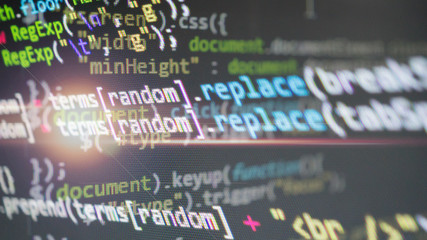 Coding application by programmer developer. Script on computer with source code. Programming code abstract background screen of software. Digital chaos background