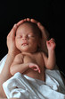 © herlanzer - baby in mother's Arms stock photo