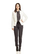 © vladimirfloyd - Young businesswoman  in pants and suit standing on white background