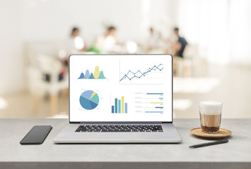 Poster - Laptop on wooden table showing charts and graph